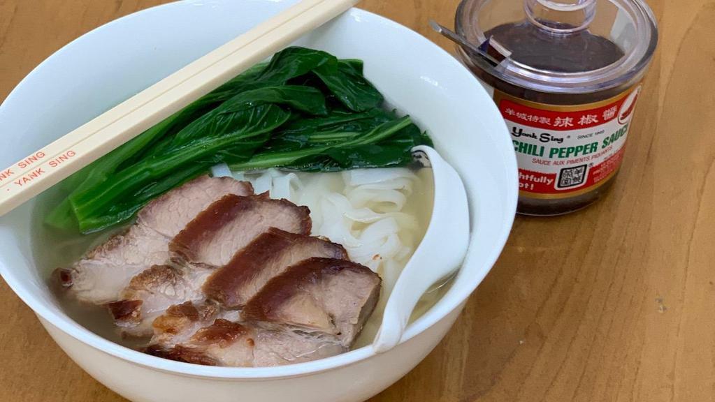 Rice Noodle Soup with BBQ Pork · Served with clear broth, choi sum vegetables and Yank Sing Chili Pepper sauce on the side