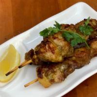 Chicken Satay · Marinated in curry and grilled on skewers