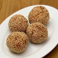 Sesame Ball (4 Pc) · Light sticky rice-flour balls stuffed with sweet lotus seed puree, rolled in sesame seeds de...