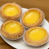 Egg Custard Tart (4 Pc) · Velvety smooth and sweet egg custard in a flaky pastry tart shell.\.