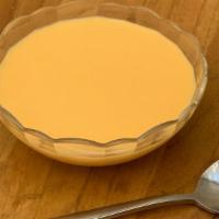 Mango Pudding · Fragrant and light creme of golden ripe mango, served chilled.