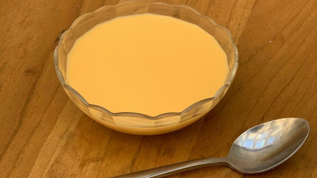 Mango Pudding · Fragrant and light creme of golden ripe mango, served chilled.