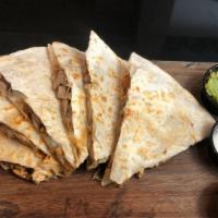 Súper Quesadilla · Two flour tortillas, melted jack cheese, any meat served with guacamole, pico de gallo, and ...