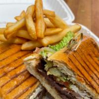 Torta Any Meat & fries · Beans, mayo, lettuce, tomato, onions, avocado, and queso fresco.