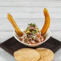 Ceviche Bowl · Lime marinaded fish mixed with pico de gallo, avocado, and two tostadas.