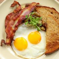 Two Eggs with Meat · choice of bacon, Homemade sausage patties, Aidells chicken apple sausage  or ham steak with ...