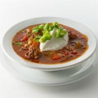 Award winning chuckwagon chili 8 oz cup · All steak Texas style chili made with cubed chuck steak, tomato, 5 types of dried chilies ga...