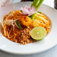 32. Pad Thai · Pan fried Thai noodle with egg, green onion, bean sprout and ground peanut in homemade-pad T...