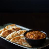 Palata With Veggie Curry · A flaky layered flatbread bread with a vegetarian curry.