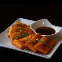 Yellow Tofu · Housemade yellow bean tofu, lightly fried and served with a sweet and tangy Burmese style sa...