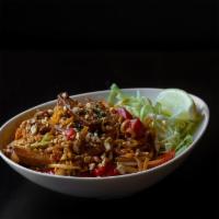 Burmese Style Pad Thai With Tofu · Rice noodles mixed with tofu, red bell peppers, onions, scallions, bean sprouts, egg, tamari...