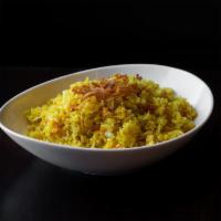 Homestyle Fried Rice · Choice of jasmine or brown rice with onions, yellow beans, turmeric, fried onions and egg (v...