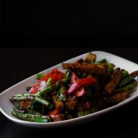 Fiery Tofu & Vegetables · Stir fried tofu, with string beans, bell peppers, garlic, ginger, basil, soy sauce and a veg...
