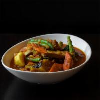 Mixed Vegetable Curry · Burmese style red curry with eggplant, tomatoes, string beans, cabbage, broccoli, opo, tofu,...