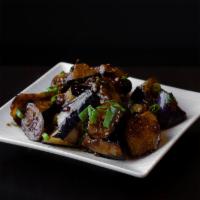 Eggplant & Garlic · Sautéed eggplant with garlic, ginger, scallions, basil, soy sauce and dried chilies.