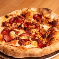 Carne pizza · Beef pepperoni, house made beef chorizo and chicken with tomato sauce