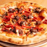 Discolandia special pizza · Beef Pepperoni, house made beef sausage, mushrooms and bell peppers with tomato sauce