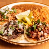 Taco Plate · 3 tacos, rice and beans.