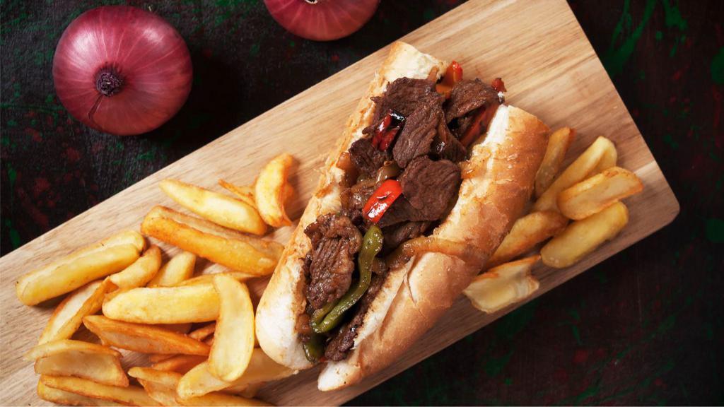 BBQ Cheesesteak · Cheesesteak with juicy, sliced steak, crispy bacon, 4 types of melted cheese, golden onion rings, smoky BBQ sauce, served on a hoagie roll.
