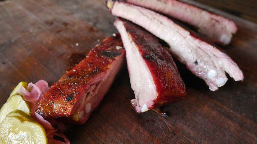 1/2 Rack of Smoked Pork Spare Ribs · Smoked for 3 - 4 hours, we serve our ribs dry, with house bbq sauce on the side

don't forget to add sides!