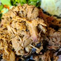 Full lb. Smoked Pulled Pork · Pork shoulder smoked over Northern California blue oak. Served with house made hot pepper vi...