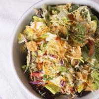 Backyard Salad · English cucumber, shredded cabbage, carrots, mixed greens,  crispy tortilla chips, cilantro,...