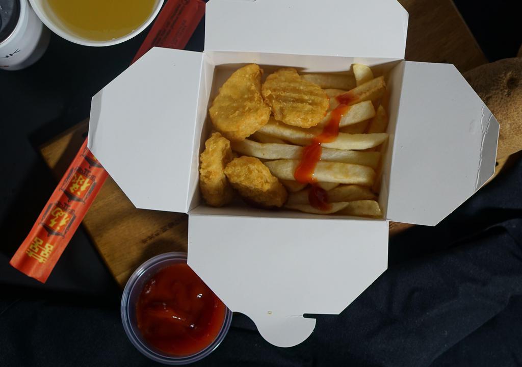 Happy Meal · Four piece nuggets and fries.