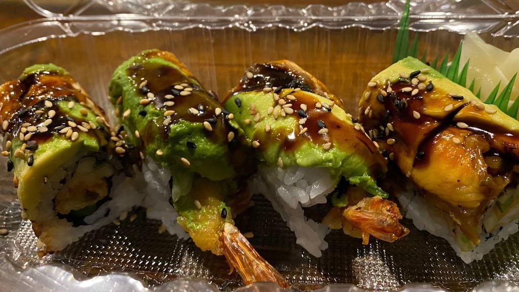 Dragon Roll · Shrimp Tempura and cucumber topped with BBQ.eel, avocado, sesame seed and eel sauce.
