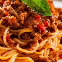 Spaghetti Bolognese Pasta · Ground beef tomato sauce. Served with steamed veggies and garlic bread.