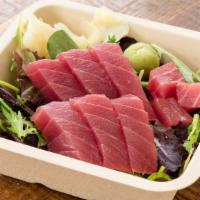 Sashimi Box · Choice of ahi tuna, salmon or hamachi over salad or rice.