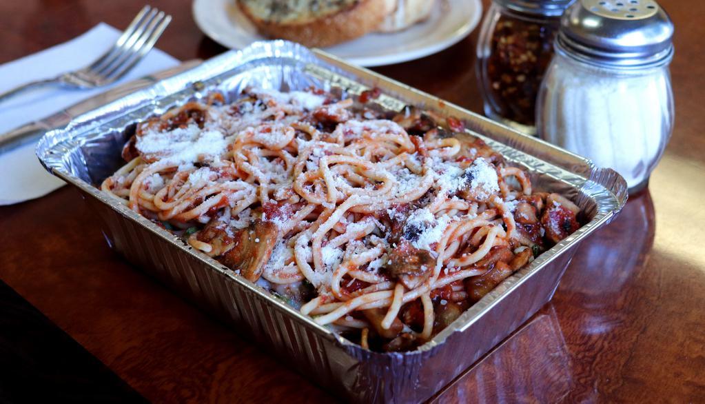 Spaghetti Al Pomodoro · Marinara, garlic, mushroom, mozzarella and parmesan cheese.