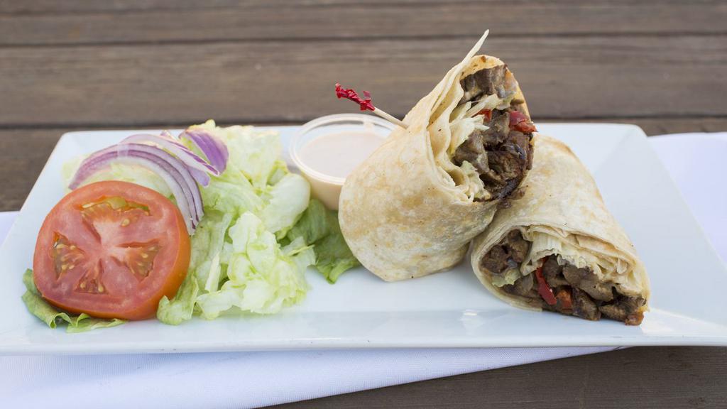 Philly Steak Wrap · Steak, sauteed bell peppers, onion, jalapenos, Swiss cheese and sriracha mayo