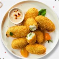 Fried Jalapeno · Try a hot favorite! Fresh jalapenos and creamy cheese wrapped in batter and fried until gold...