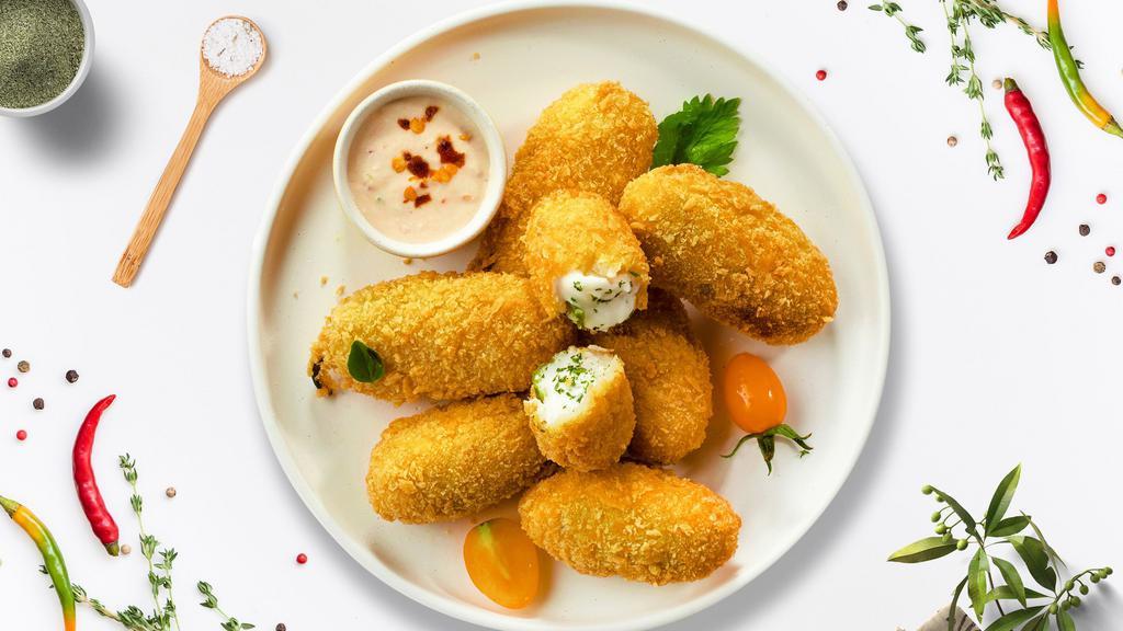 Fried Jalapeno · Try a hot favorite! Fresh jalapenos and creamy cheese wrapped in batter and fried until golden brown