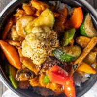 51. Clay Pot Rice Stir Fried Dish · Rice cooked in clay pot with chicken, shrimp, onion, mushroom, carrot, baby corn, zucchini a...