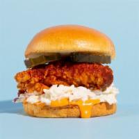 Nashville Hot Fried Chicken Sandwich · Buttermilk fried and served on a brioche bun with pickles, cole slaw, house spicy sauce. Ser...
