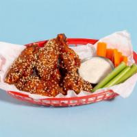 Fried Korean Chicken Wings · (6) Bone-in wings drenched in house sweet spicy sauce, tossed with sesame seeds, scallions a...
