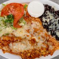 Chilaquiles con Huevo · Fried corn tortilla with eggs. Served with rice, beans, lettuce, guacamole, and sour cream.