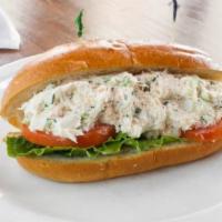 Crab Sandwich · Crab, mayo, celery and chives with lettuce and tomato on a brioche roll.