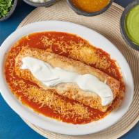 19. Burrito Mojado · Wet burrito, meat, rice, whole beans, onions, cilantro, guacamole, extra sour cream, extra c...