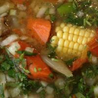 36. Caldo de Res (Beef Stew) · Chayote squash, carrot, potato, cabbage, corn on the cob, cilantro and side of rice and tort...