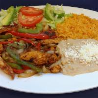 7. Fajitas · Green bell peppers, onions, tomato, lime juice, spicy diabla sauce, and your choice of chick...