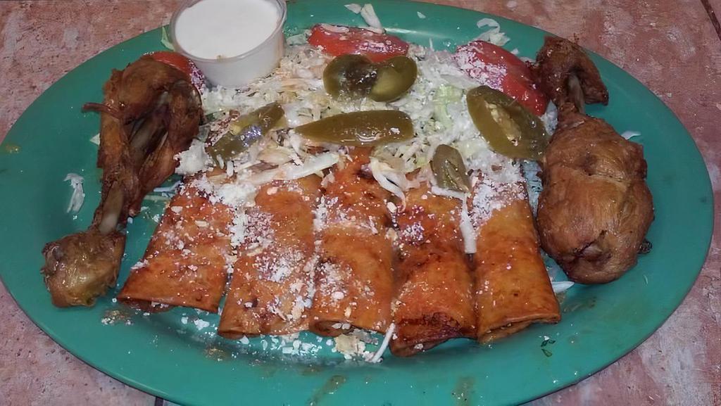 8. Enchiladas Michoacanas (5) · Red enchiladas with oregano, onions, vinegar, Mexican grated cheese, green cabbage or lettuce, and a side of fried chicken or beef jerky.