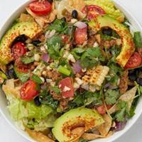 Impossible Taco Bowl · Plant-based seasoned ground beef, grilled corn Pico de Gallo, spiced black beans, avocado, R...