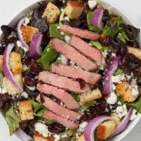 Steak Salad · Chargrilled tri-tip, mixed greens, crumbled blue cheese, sun-dried cranberries, rosemary cro...