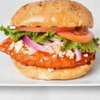 Spicy Buffalo Sandwich · Crisp-fried chicken breast, dipped in house-made buffalo sauce with crumbled blue cheese, re...