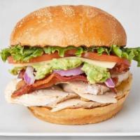 Chicken Club · Jack's Chicken Club includes swiss cheese, crisp bacon, avocado, leaf lettuce, red onion, to...