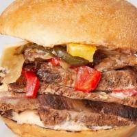 California Cheese Steak · Chargrilled tri-tip, pepper jack cheese, sautéed mushrooms, roasted peppers and onion mix, a...