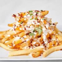 Urban Fries · Fries with a spicy chili oil, Bleu cheese dressing and chili flakes.