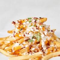 Urban Fries - Family Size · Fries with a spicy chili oil, Bleu cheese dressing and chili flakes.